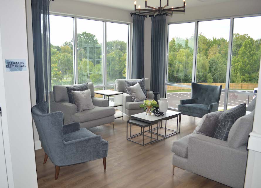 Seating area with floor to ceiling windows